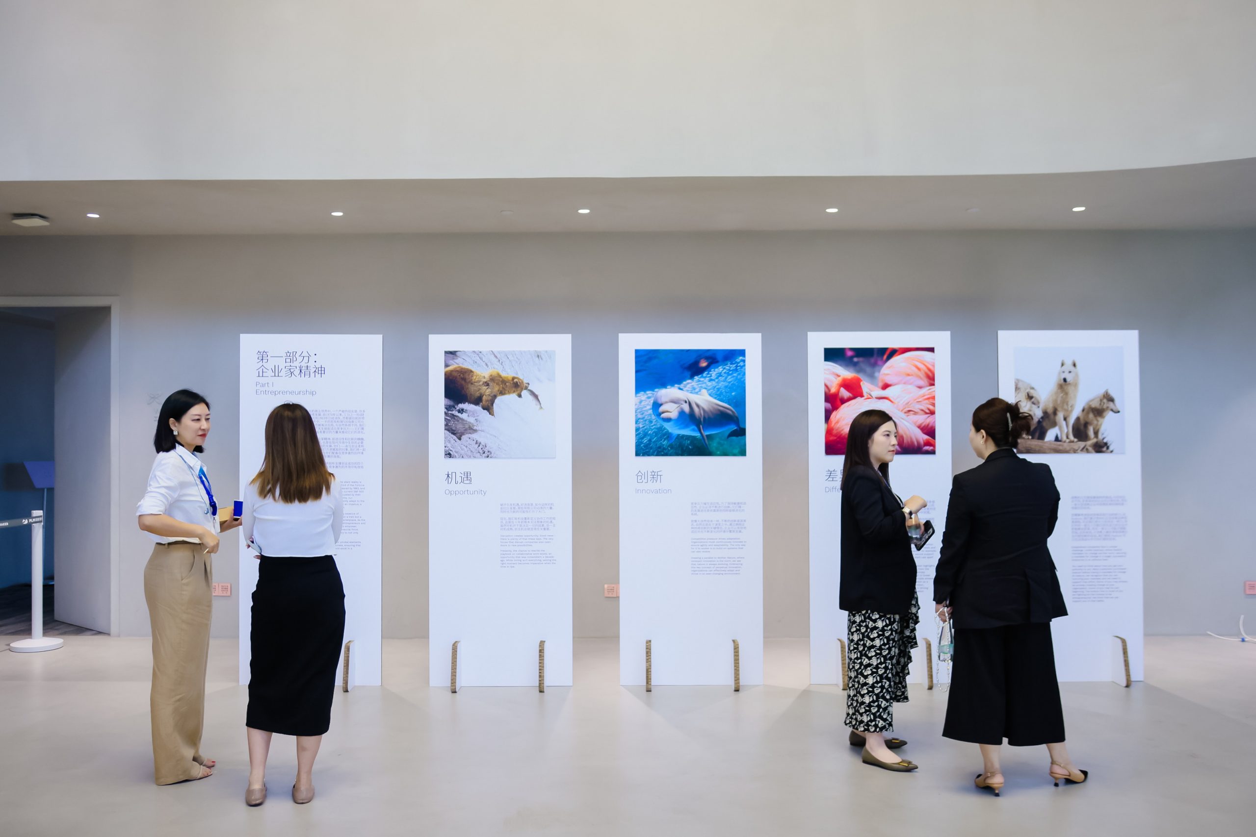  Attendees visiting the art exhibition. 